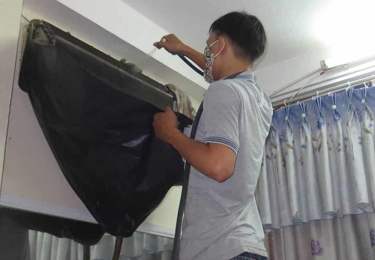 Vệ sinh máy lạnh Quận 9 - Hùng Cường